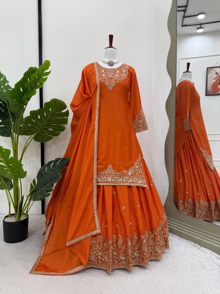 Beautiful Orange Short Kurti And Silk Lehenga With Sequence Work
