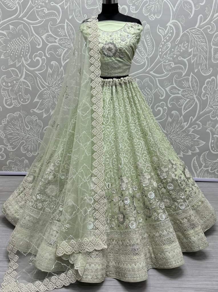 Pista Color Heavy Embroidered Sequence Net Lehenga Choli