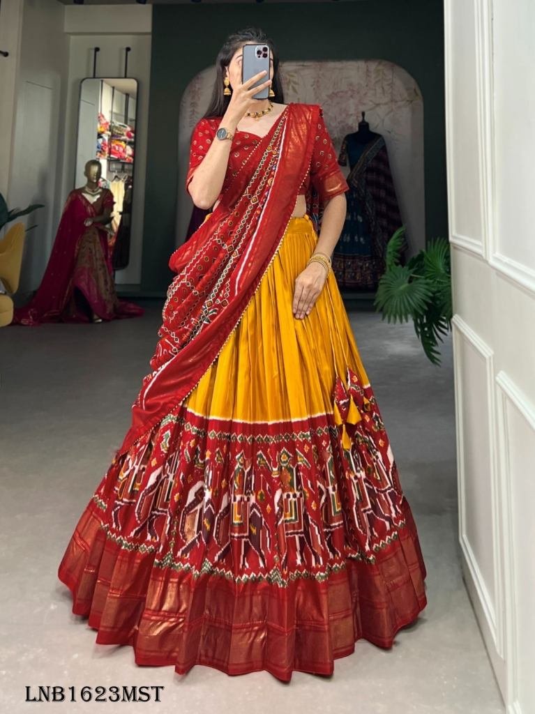 Yellow Elegant Dola Silk Patola Lehenga Choli by fab funda