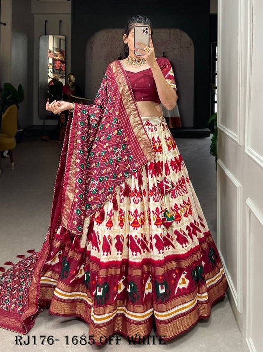 Off White Color Patola Printed With Foil Work Tussar Silk Lehenga Choli