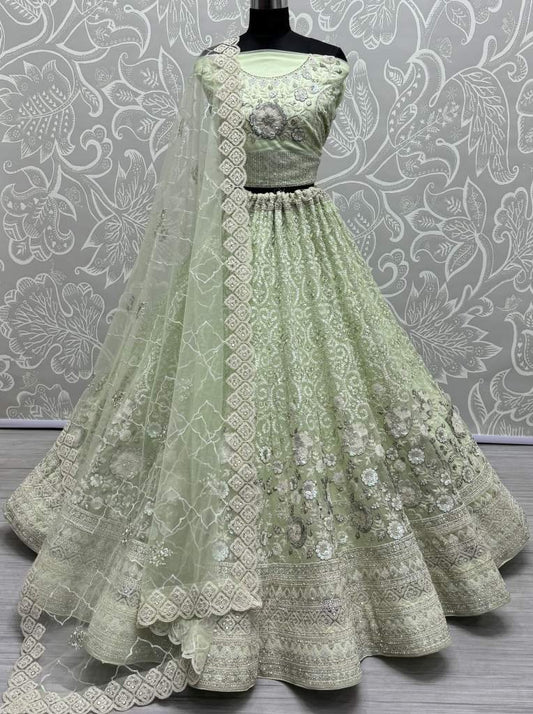 Pista Color Heavy Embroidered Sequence Net Lehenga Choli