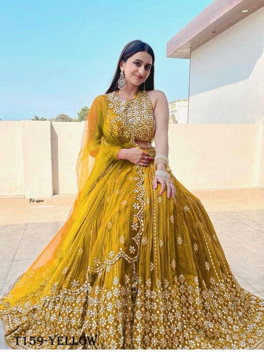 Trady Yellow Georgette With Design Work Lehenga Choli