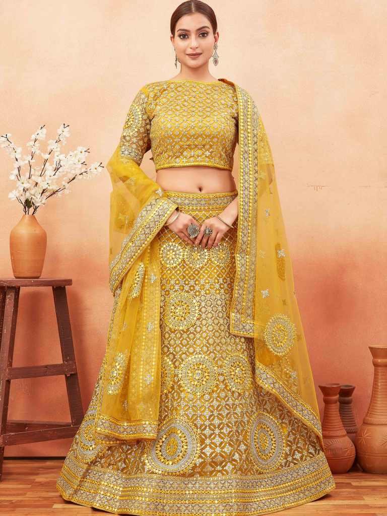 Wedding Wear Yellow Color Stone and Embroidered Work Net Lehenga choli